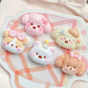Detailed macro view of 5 cute resin cartoon puppy charms for DIY craft accessories