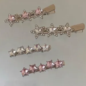 Sparkly silver star hair clips set with pink and clear rhinestones for girls