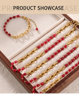 Detail of red agate garnet necklace and bracelet set in a wooden jewelry showcase box