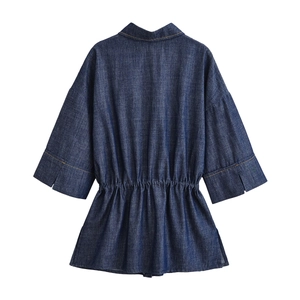 Back view of women's deep blue denim safari shirt with adjustable drawstring waist detail