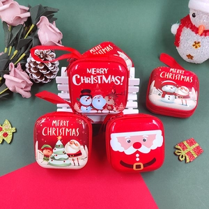 Christmas tinplate mini coin purses with festive Santa and reindeer designs and zippers