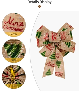 Detail view of burlap Christmas bow showing Merry Christmas print and tie backing