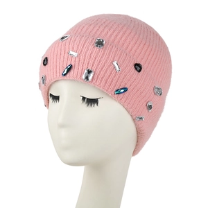 Pink knit beanie for women featuring sparkling rhinestones and a stylish cuffed design