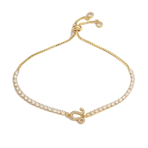 Adjustable golden snake bracelet with cubic zirconia and a sliding box chain