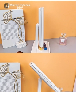Detail view of white LED makeup mirror with 360 degree rotation and adjustable stand