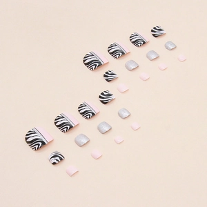 Sparkly zebra print and silver glitter press-on toe nails set for women in black and white