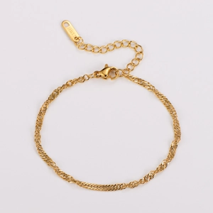 Detail of golden water wave chain bracelet with adjustable link and S.Steel tag