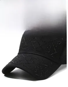 Detail of black baseball cap featuring shimmering rhinestones in a geometric pattern