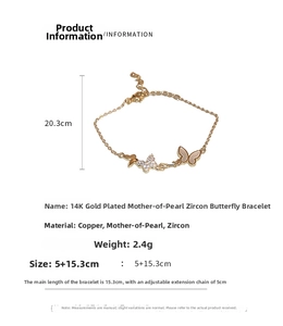 Close-up of 14K gold plated butterfly bracelet with mother of pearl and zircon stones
