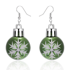 Close-up of green Christmas bulb earrings with white snowflake patterns and silver hooks
