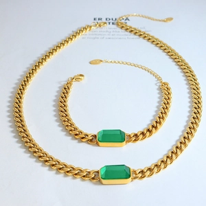 Golden Cuban link jewelry set with emerald rectangle stone necklace and bracelet