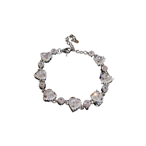 Luxury silver heart bracelet with pink zircon stones and adjustable lobster clasp