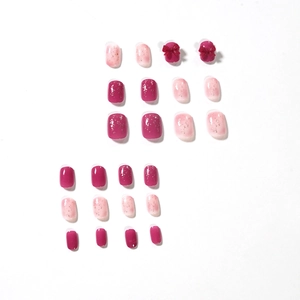 Set unghie finte glitter rosa con fiocchi 3D rossi e 24 tips corte arrotondate