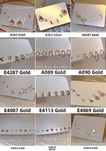 Collection of various gold and silver stud earrings with cubic zirconia and pearls