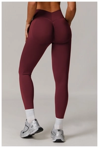 Rear view of high waist burgundy yoga leggings with scrunch butt lift and V-shaped waist