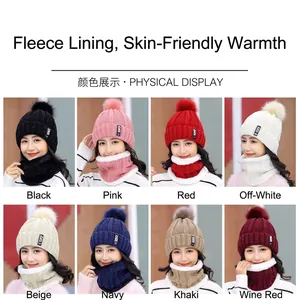 Women's winter knit beanie hat and neck scarf set with fleece lining and pompom detail