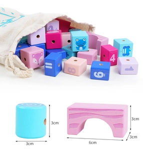 Detail of colorful wooden alphabet blocks with animal patterns and size dimensions
