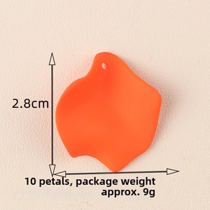 Detailed view of orange acrylic petal charm with matte finish and 2.5cm size markings