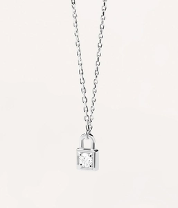 Macro shot of silver padlock pendant with a sparkling center zircon and fine chain