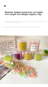 Colorful macaron elastic hair bands in clear jars with minimalist Nordic style background