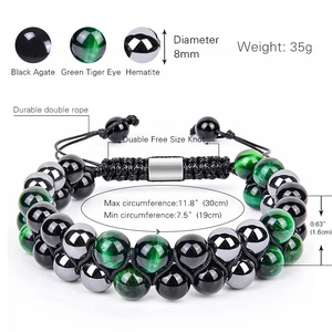 Double layer bracelet with green tiger eye, black agate and hematite beads on white background