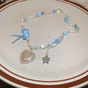 Collier de perles de style français avec nœud bleu et pendentifs cœur étoile