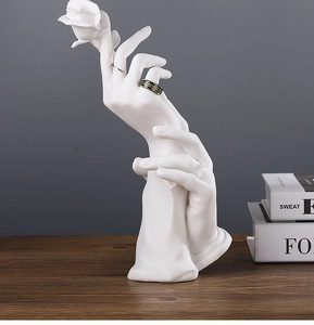 Artistic hand sculpture jewelry display stand in matte white resin for rings and bracelets