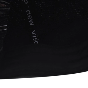 Close-up of the grey 'new visic' embroidery on a premium black short-brim baseball cap