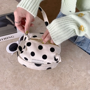 Minimalist cream canvas handbag with black polka dots and LOVE SOZAKKA woven label