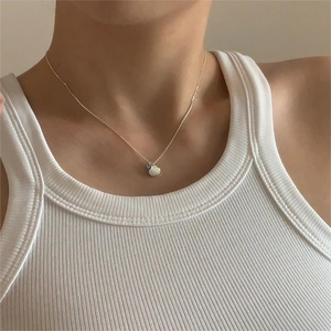 Minimalist 925 sterling silver necklace with blue zircon and shell pendant on golden chain