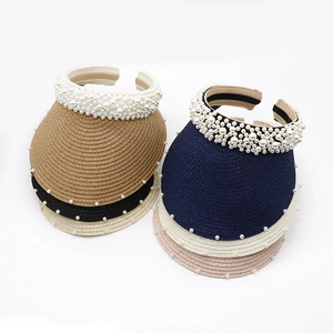 Women's woven straw visor with pearl trim available in beige, pink, black, khaki, and blue