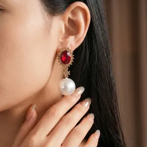 Vintage cross earrings with red gemstone and large white pearl in baroque court style
