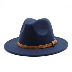 Detail of navy wool fedora hat featuring a brown snakeskin pattern leather band with buckle