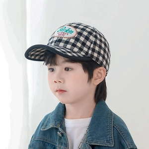 Kids stylish black and white houndstooth baseball cap with oval embroidered patch