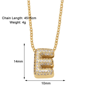Macro detail of gold plated letter E pendant with white zircon stones and chain dimensions