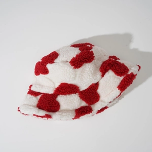 Winter plush bucket hat with red heart pattern in thick faux lamb wool for warmth