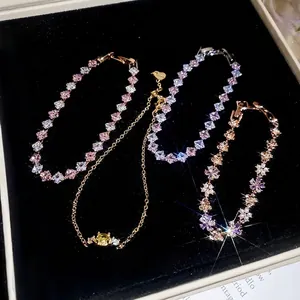 Elegant zircon flower pearl bracelet set displayed on premium black velvet jewelry box