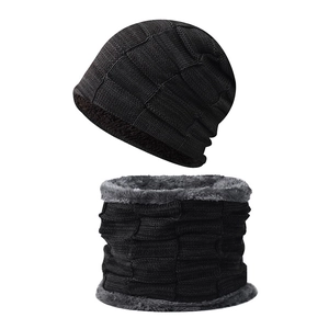 Two-piece black knit beanie and neck warmer set with thick grey fleece lining