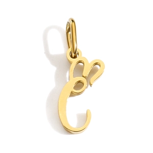 Close-up of golden letter C pendant with rabbit ears and a polished metal finish