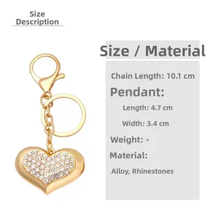 Detailed view of heart-shaped rhinestone keychain with gold alloy plating and dimensions