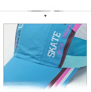 Detail view of quick-dry baseball cap featuring breathable mesh and colorful patchwork