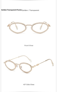 Close-up of golden oval frames with sparkling rhinestones and transparent lenses