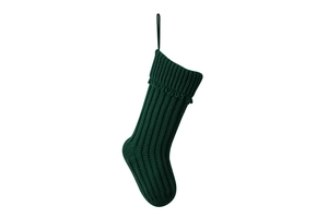 Detail of dark green knitted Christmas stocking with thick texture and hanging loop