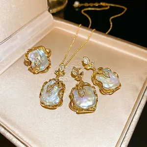 Parure de bijoux en perles baroques dorées avec collier boucles d'oreilles et bague