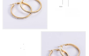 Detailed view of gold-plated hoop earrings featuring a pave-set zircon crystal inlay