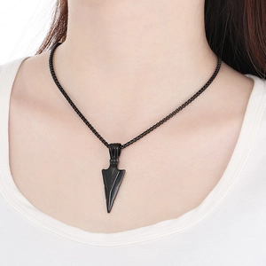 Close-up of hip-hop black arrow pendant necklace on model showing style and scale