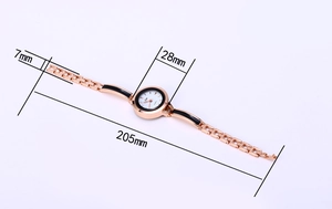Detail view of rose gold quartz watch with 28mm white dial and 7mm chain strap