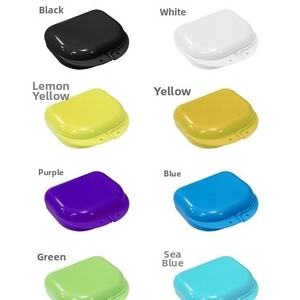 Macro display of portable dental retainer cases in eight vibrant assorted colors