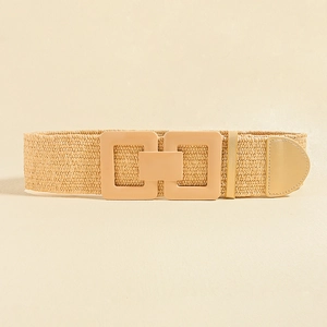 Detail of bohemian straw woven belt with dual geometric alloy buckle and beige texture