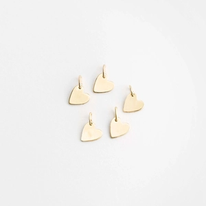 Set of five polished heart-shaped stainless steel pendants for DIY jewelry making